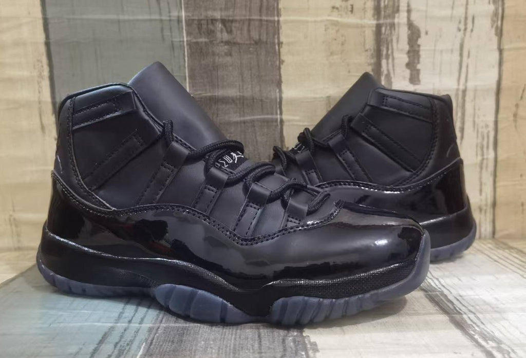 Comme des Garçons Homme Plus x Air Jordan 11 Retro “Black”